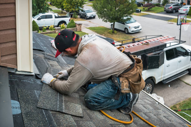 Professional Roofing technician working in Burlington, TX